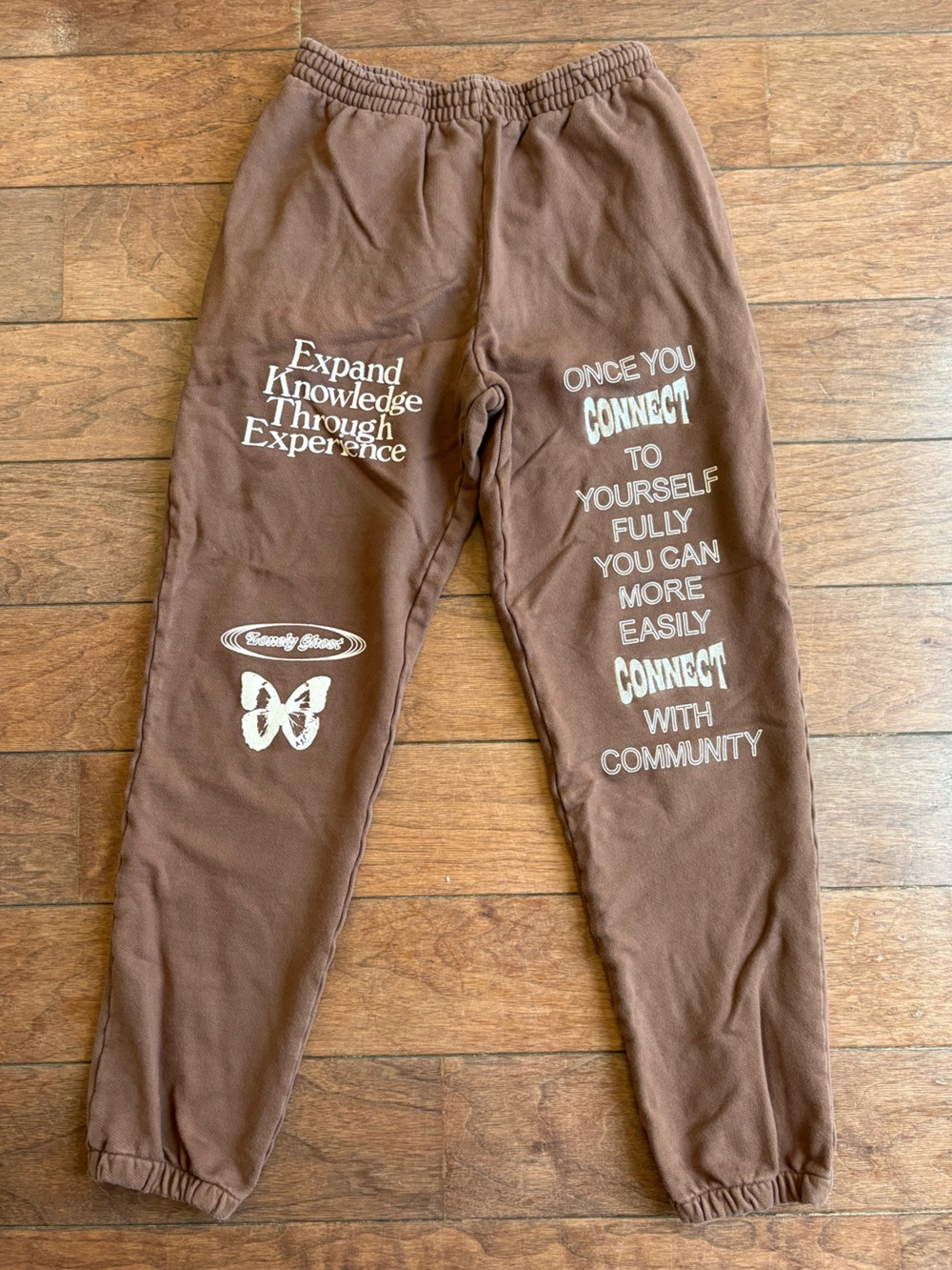 LONELY GHOST Brown Sweatpants with White Graphic Text